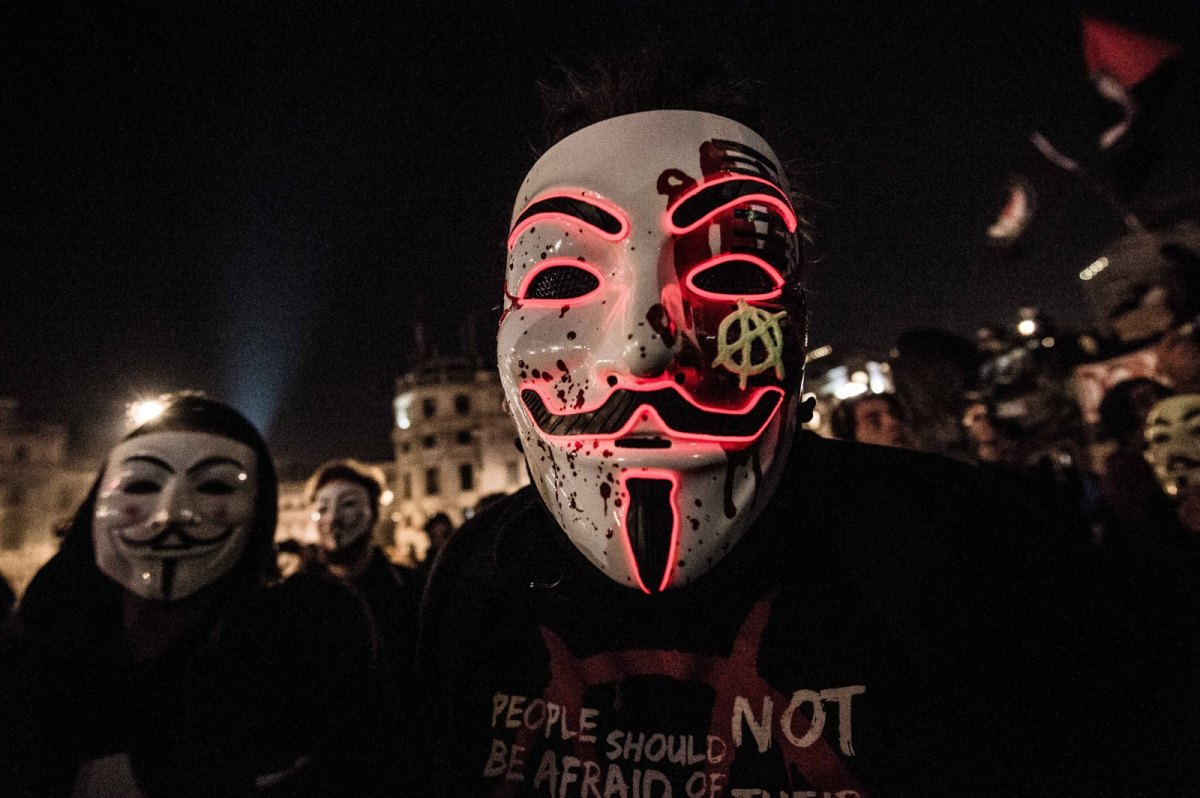 Demonstrant mit "Guy Fawkes"-Maske