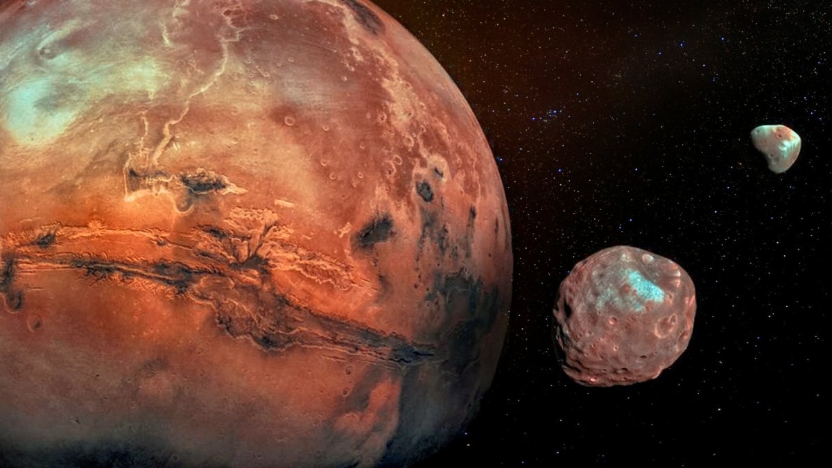 Der Planet Mars und seine zwei Monde Phobos und Deimos.