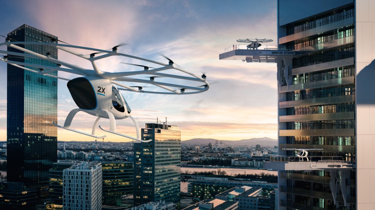 Volocopter fliegen in einer Stadt aus Hochhäusern
