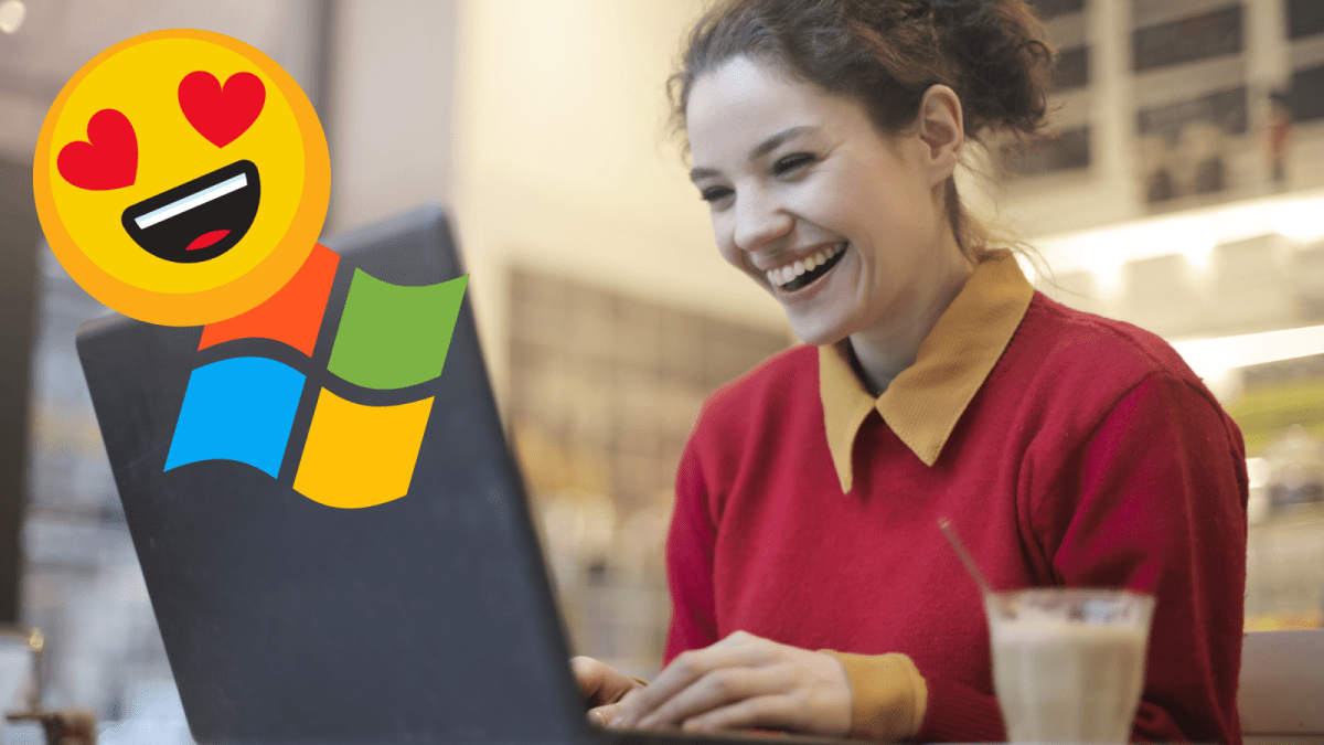 Frau vor dem Laptop/ Windowszeichen und Emoji