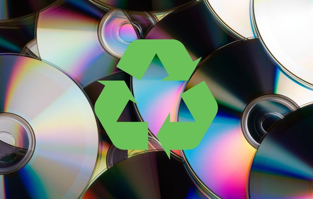 CDs und das Recycling-Logo.