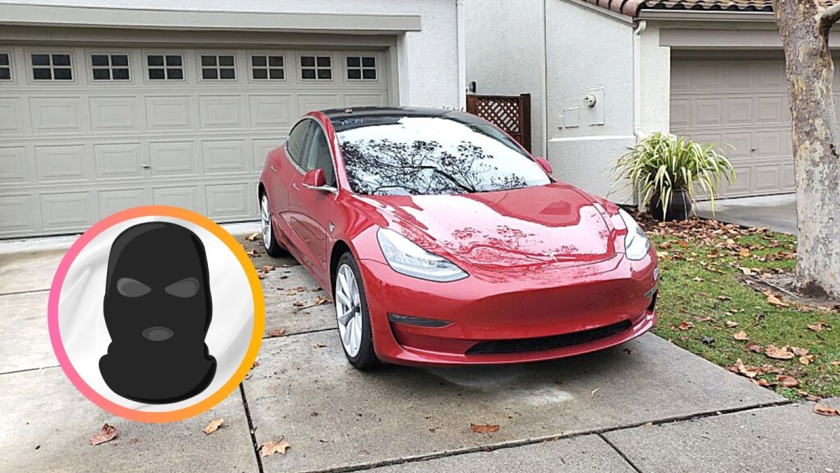 Tesla Model 3 in einer Einfahrt