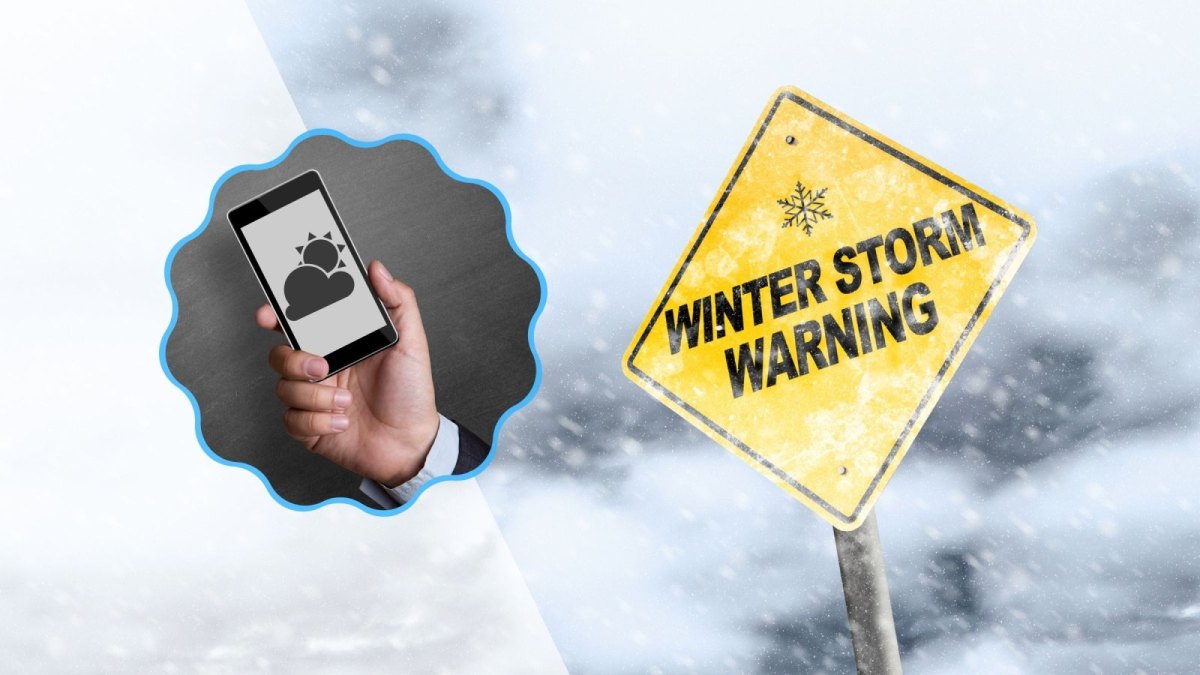 Winter Warnschild und eine Wetter-App