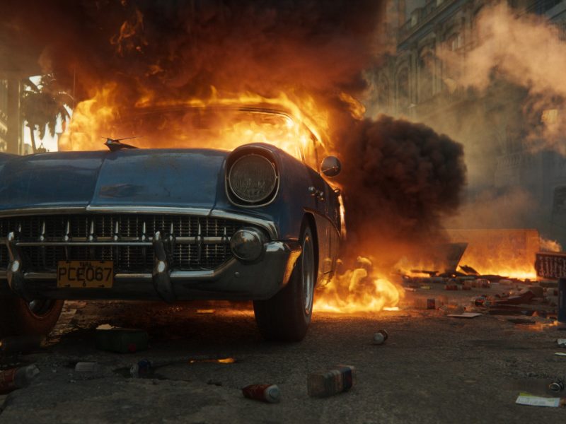 Screenshot aus Far Cry 6 brennendes Auto
