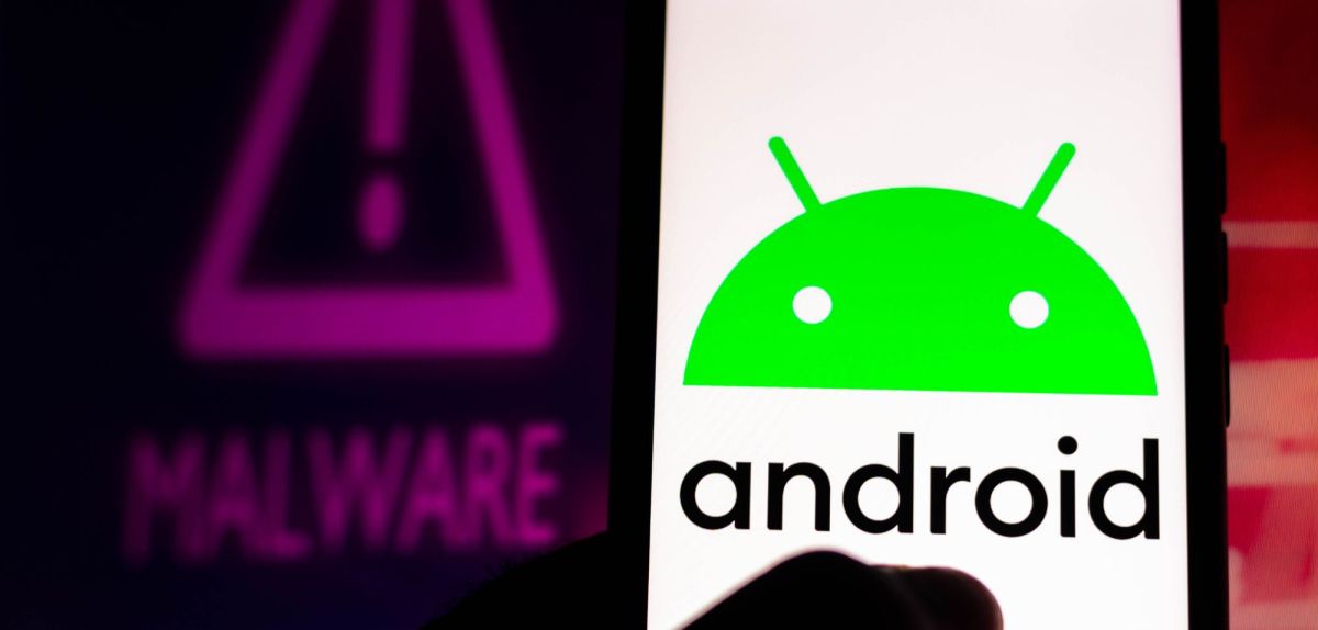 Android Logo auf Handy im Hintergrund Malware Warnung