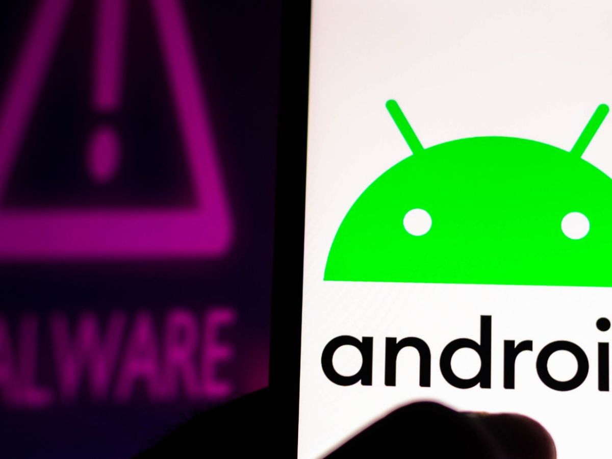 Android Logo auf Handy im Hintergrund Malware Warnung