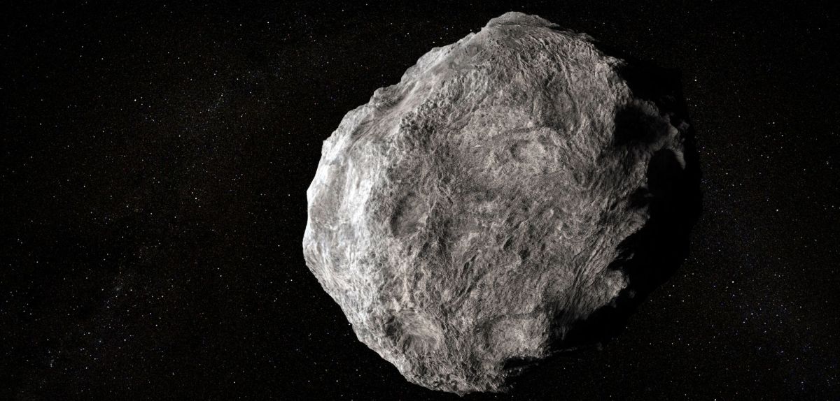 Darstellung eines Asteroiden im All.
