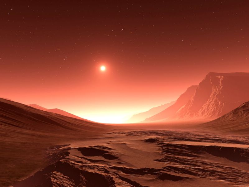 Oberfläche des Mars mit der Sonne