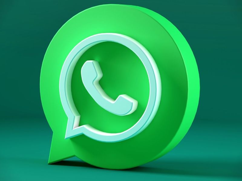 Grafische Darstellung des WhatsApp-Logos vor grünem Hintergrund.