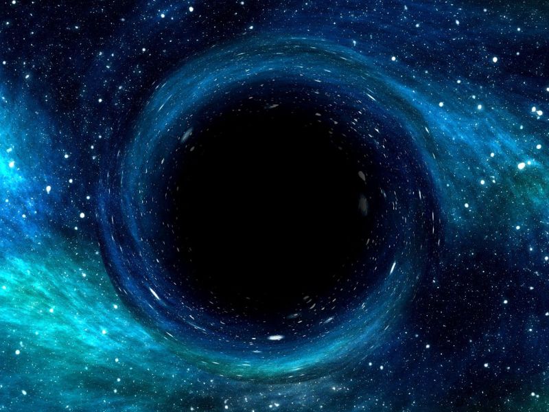 Grafische Darstellung eines Schwarzen Lochs im Weltall.