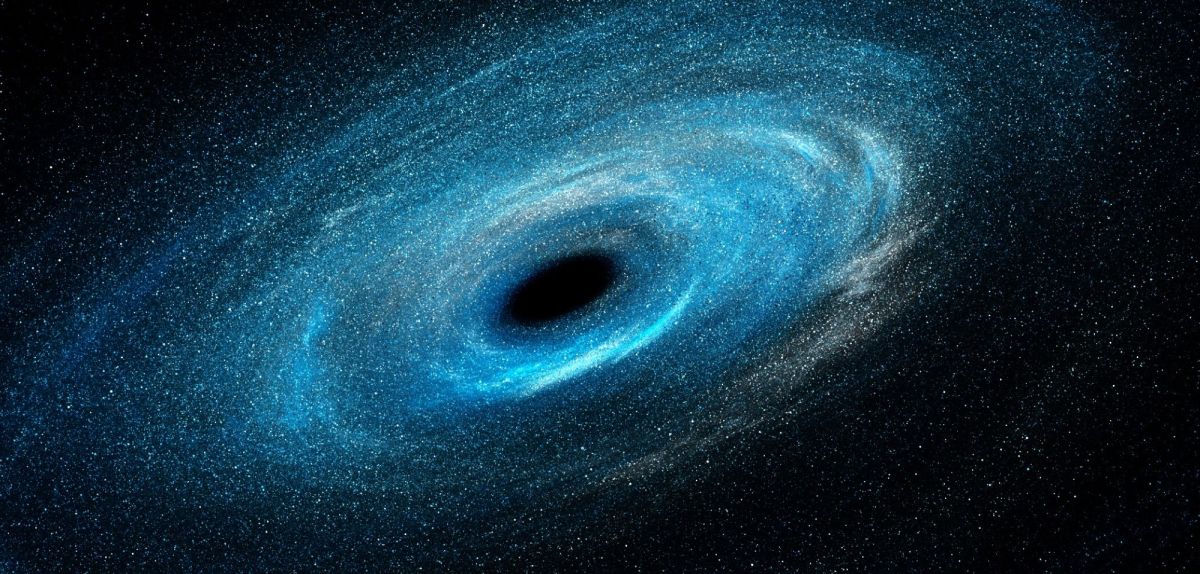 Ein Schwarzes Loch inmitten einer Spiralgalaxie.