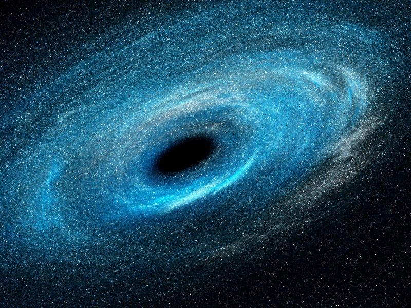 Ein Schwarzes Loch inmitten einer Spiralgalaxie.