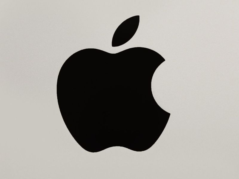 Apple-Logo vor grauem Hintergrund.