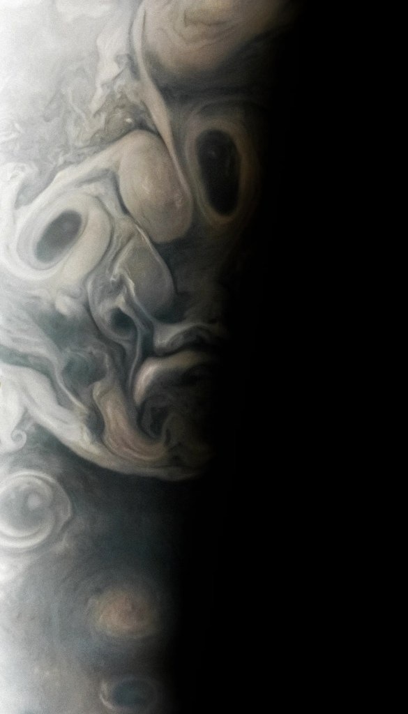 Wolken und Stürme auf Jupiter in Form eines Gesichts.