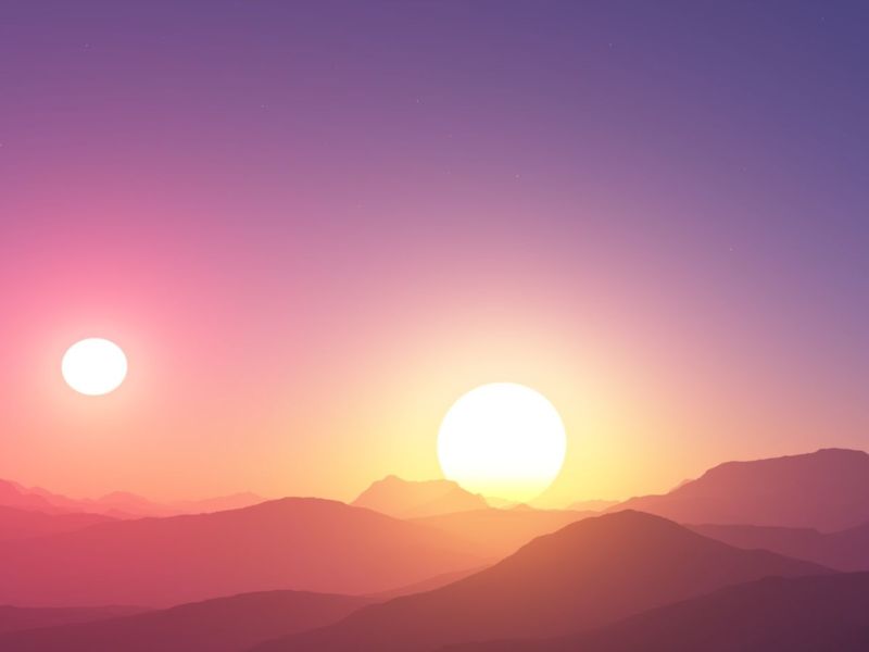 Doppelter Sonnenuntergang hinter Hügeln