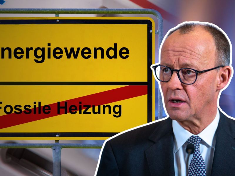 Friedrich Merz sitzt vor einem Schild mit der Aufschrift 