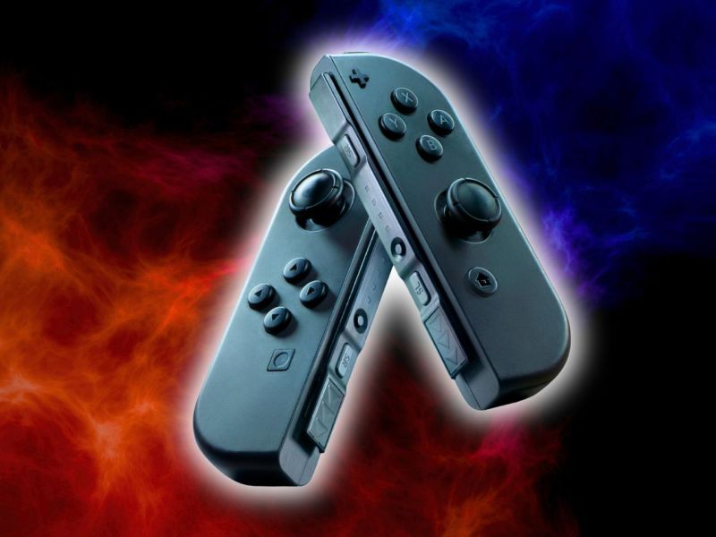 Joy-Cons vor roten und blauem Rauch