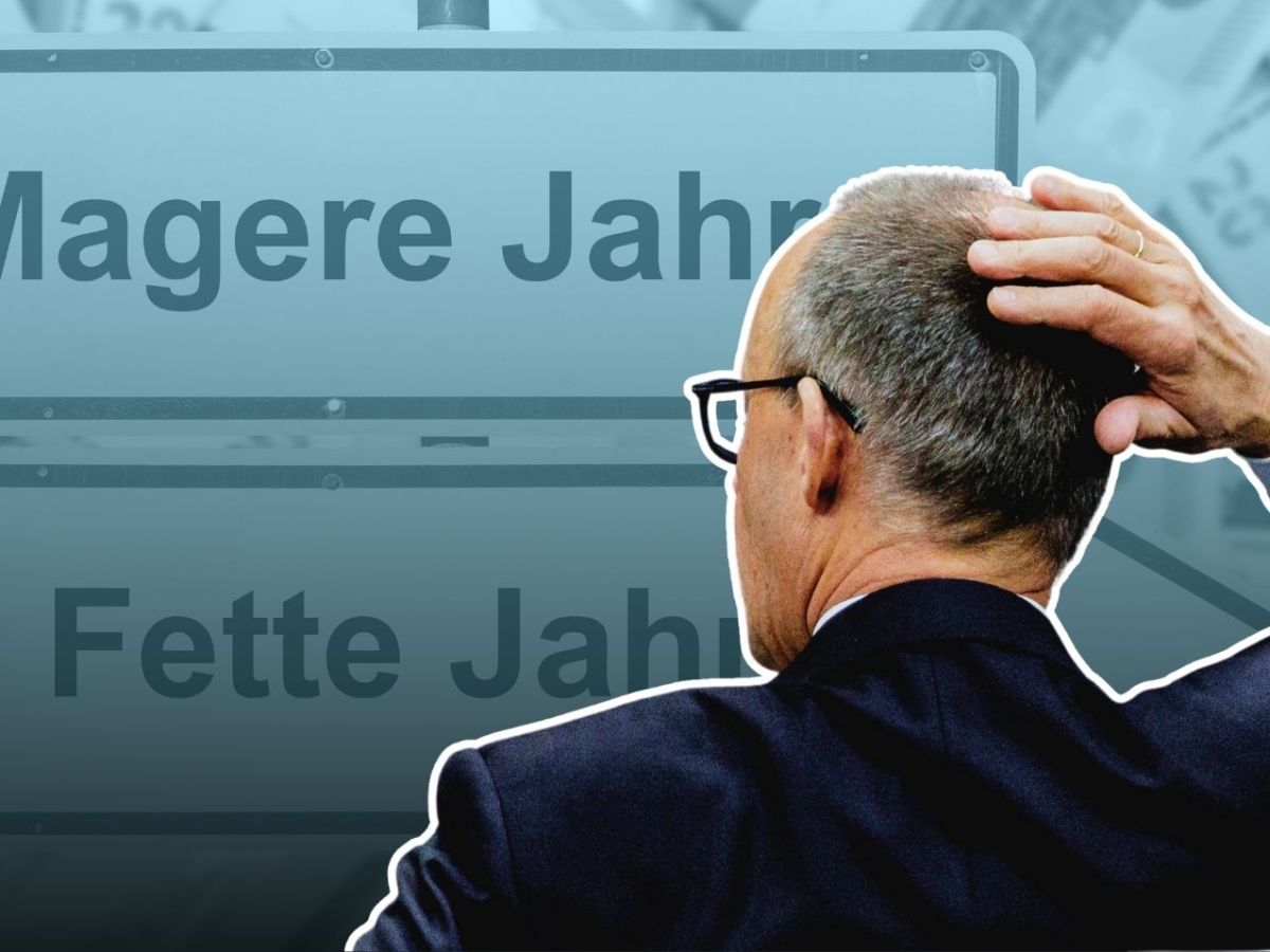 Friedrich Merz (CDU) vor einem Schild mit der Aufschrift 