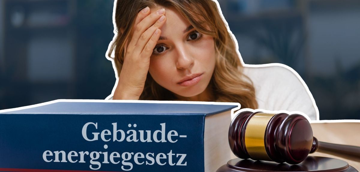 Frau blickt genervt auf das Gebäudeenergiegesetz.